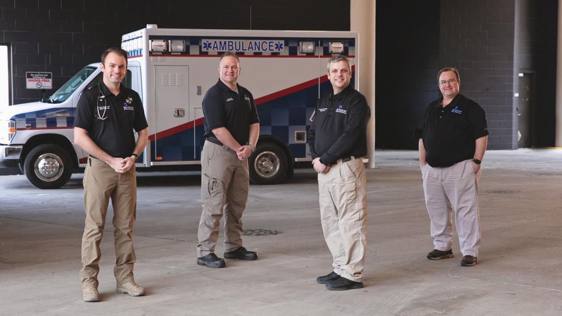 Emergency Medicine Team In Front of Ambulance