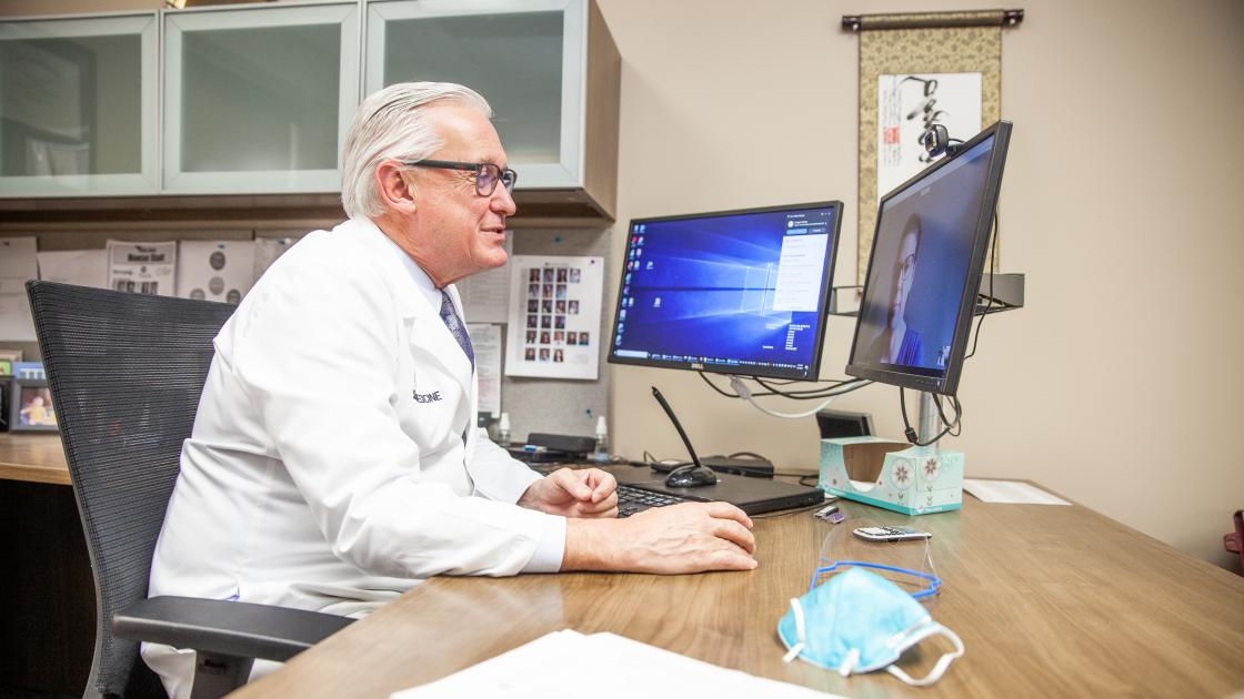 Dr. Carlson sees patient via telehealth