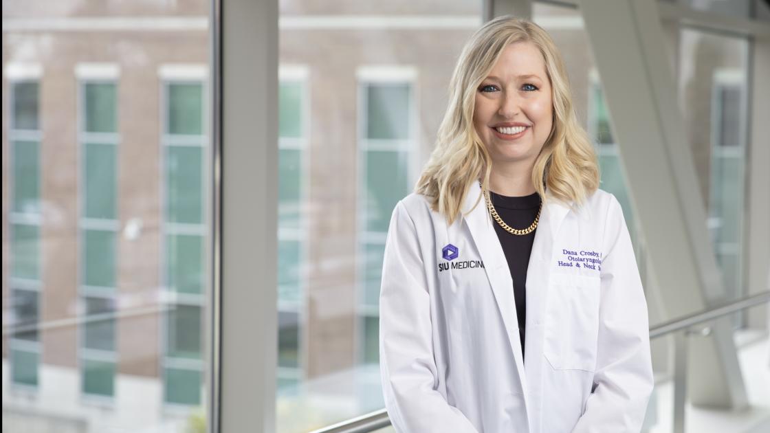 Female doctor smiling to camera