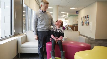 Patient Brenna sits with Dr. Colon to talk about 10 years of care.