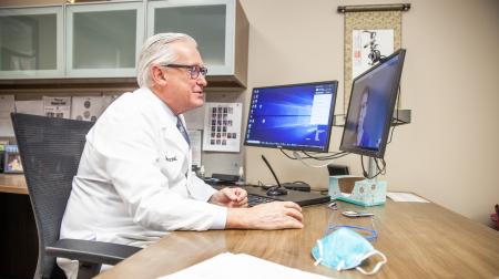 Dr. Carlson sees patient via telehealth