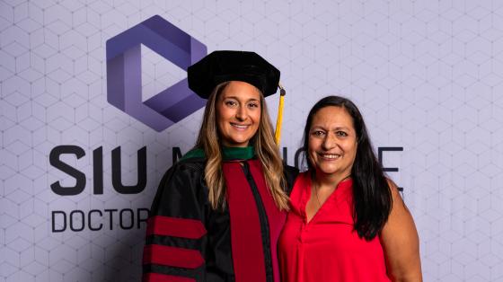 Allysen Shaughnessy with her mother at the 2022 SIU DMSc hooding ceremony