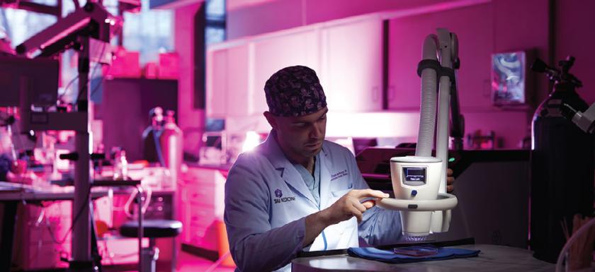 A SIU student working in a research lab